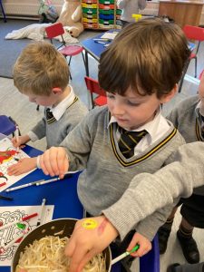 Children enjoying cooking activities at Inchmarlo school.