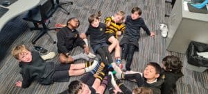 Children playing and relaxing at Inchmarlo, a family-friendly resort in Scotland.