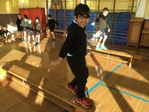 Children enjoying indoor gym activities at Inchmarlo School.