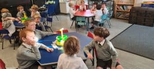 Children playing and socializing at Inchmarlo community center.