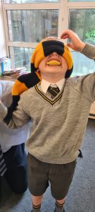 Person in costume with headset at Inchmarlo estate.