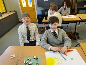 Children engaging in classroom activities at Inchmarlo School, promoting quality education and learning.