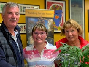 Happy people at Inchmarlo community event in Scotland.