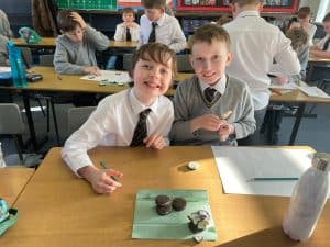 Students engaging in classroom activities at Inchmarlo school, fostering learning and development.