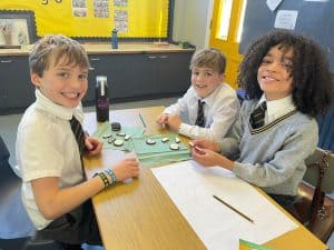 Happy children engaging in classroom activities at Inchmarlo School.