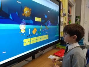 Engaging children with educational activities at Inchmarlo School.